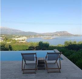 5 bedroom luxury villa with infinity pool, sea views and tennis court near Chania, sleeps 10